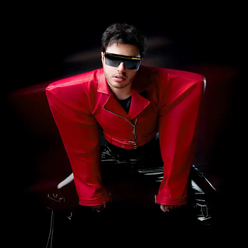 MkX MkX is pictured in a bright red large-shoulder leather jacket